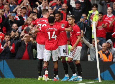 Marcus Rashford celebrates a goal with team-mates.