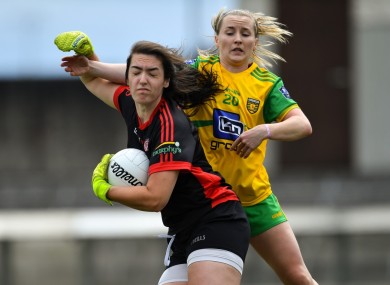 Shannon Lynch of Tyrone in action against Niamh McLaughlin of Donegal.