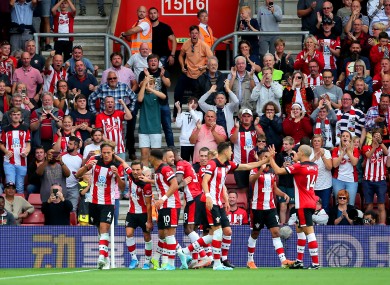 Vestergaard celebrates with his Southampton team-mates.