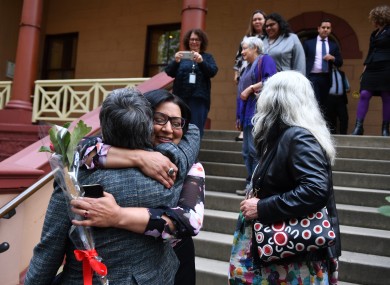MP Jenny Leong is hugged by a supporter outside Parliament House after the passing of the amended Abortion Law Reform Act.