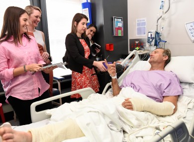 Neil Parker speaks to media from his hospital bed in Brisbane.