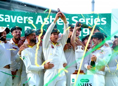 Australia players celebrate retaining the Ashes at the end of the fifth test match at The Oval.