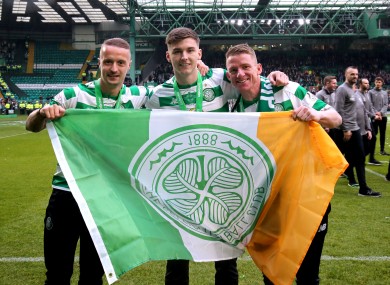 Tierney (centre) joined Arsenal from Celtic last summer.