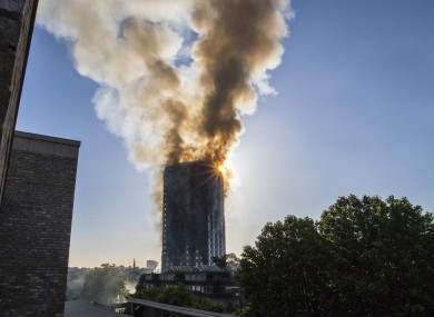 Smoke billows from a fire at Grenfell Tower in west London