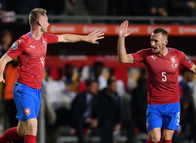 Jakub Brabec (left) celebrates scoring against England.