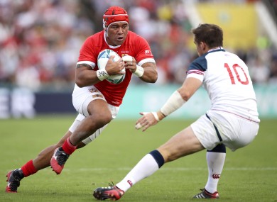 Siale Piutau runs at AJ MacGinty during this morning's pool c match.