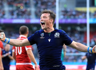 Horne celebrates his first try.