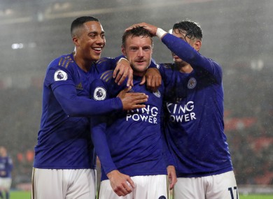 Leicester City's Jamie Vardy (centre) celebrates scoring his side's fifth goal.
