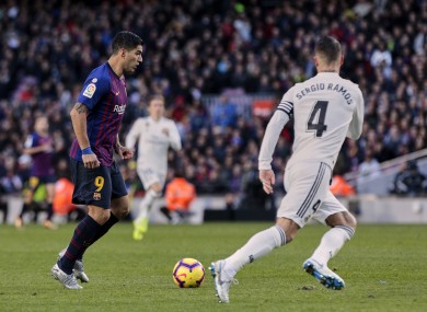 Barca striker Luis Suarez and Real Madrid captain Sergio Ramos.