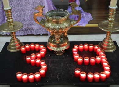Candles at a mass and prayer vigil for the 39 victims in Essex earlier this month.
