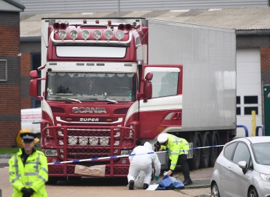 Police examine the truck where 39 migrants were found dead in Grays, Essex last week