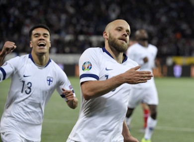 Teemu Pukki celebrates scoring a goal for Finland.