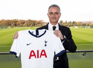 Jose with the Tottenham shirt.