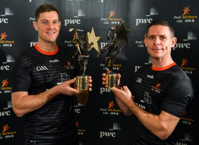 Seamus Callanan and Stephen Cluxton with their 2019 PwC Footballer and Hurler of the Year awards at the Convention Centre in Dublin.