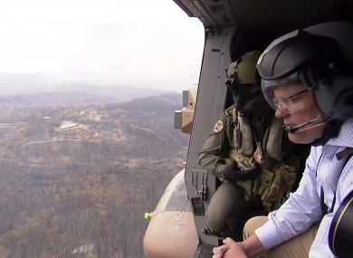 Australia's Prime Minister Scott Morrison looks out from a helicopter Gospers Mountain, New South Wales.