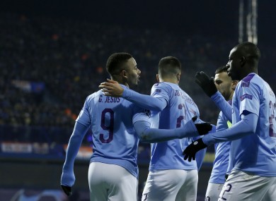 Manchester City's Gabriel Jesus, left, celebrates with team-mates.
