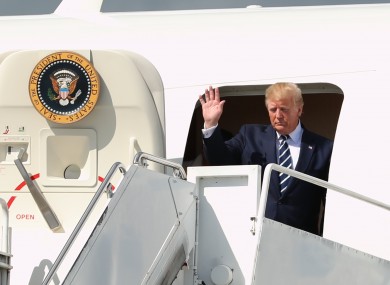 US President Donald Trump waves as he arrived at Shannon Airport, on Air Force Two for a visit to Ireland.