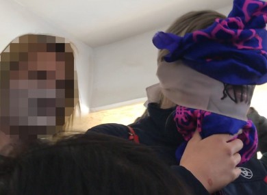 The woman - who cannot be named - leaving court with her mother (left).