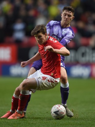 Dara O'Shea tangling with Josh Davison during West Bromwich Albion's FA Cup third-round win over Charlton Athletic.