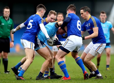 Dublin's Cian Murphy is surrounded by Longford players.