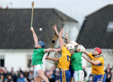 Limerick's Mike Casey and Tom Condon challenge with Aaron Shanagher, Ryan Taylor and Niall Deasy of Clare.