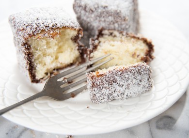 A lamington cake is made from sponge cake, chocolate sauce and grated coconut.
