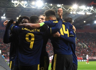 Lacazette celebrates his late goal with his Arsenal team-mates.