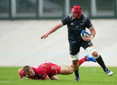 John Hodnett beats a tackle in a Scarlets 'A' v Munster 'A' match last September.