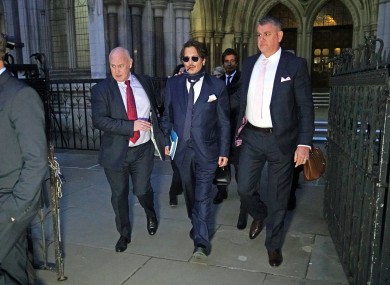 Depp leaving court today.