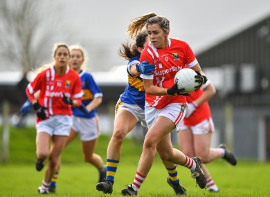 Maire O'Callaghan of Cork is tackled by Tipperary's Roisin Daly during their Lidl Ladies National Football League Div 1 Round 2 match in Clonmel. Photo by Eóin Noonan/Sportsfile