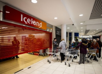 Shoppers waiting at the Iceland store in the Kennedy Centre, Belfast, to open early for a dedicated shopping session for older people