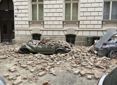 A car is crushed by falling debris after the earthquake in Zagreb, Croatia.