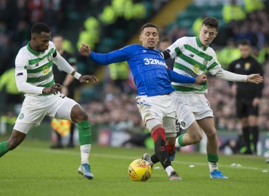 Celtic's Boli Bolingoli (left) and Mikey Johnston (right) challenge Rangers captain James Tavenier.