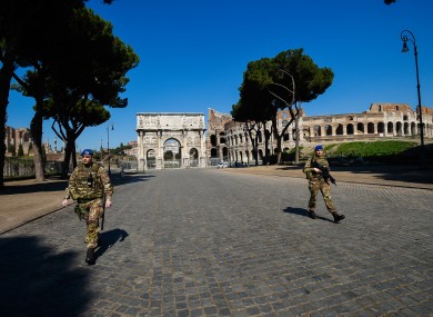 Italian army in front of the Colosseum and Arch of Constantine