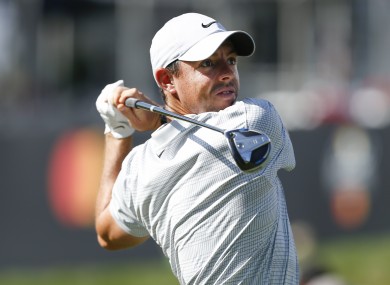 Rory Mcilroy hits his tee shot on the 18th hole.