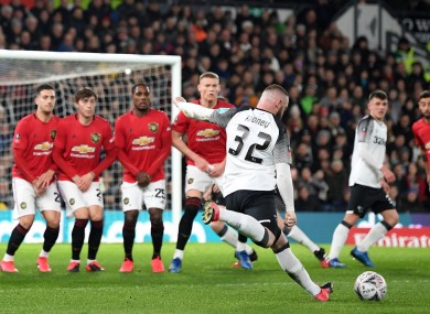 Wayne Rooney takes a free-kick against Manchester United