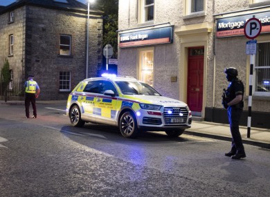Armed Garda Units back up uniformed gardai in checking cars on New Street in Longford Town last summer.