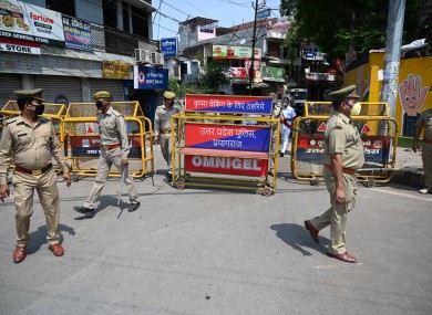 Police barricade hotspot area Telierganj during a government-imposed nationwide lockdown.