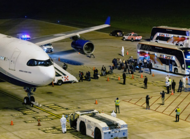 Passengers board plane to Australia.