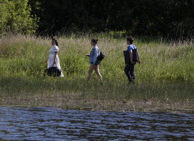 People enjoying a stroll by the Blessington Lakes on Monday.