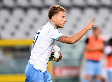 Ciro Immobile celebrates Lazio's equaliser.