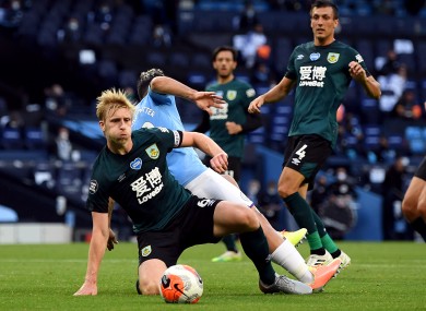 Ben Mee in action against Man City.