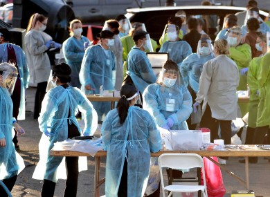 Hundreds of people tested in Phoenix, Arizona following surge in new cases. The governor yesterday shut bars, theatres and water parks.