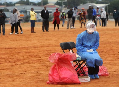 A medical worker waits for a patient in Johannesburg.