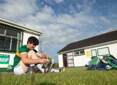 Ronan Corcoran gets ready for training outside the closed dressing rooms at Ballyhale Shamrocks.