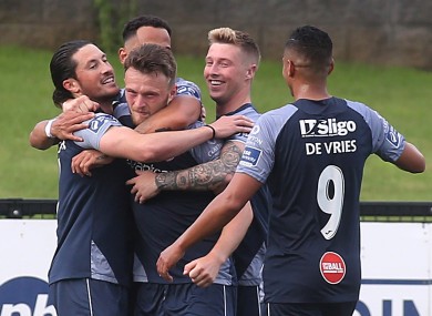 Sligo’s Ronan Coughlan celebrates their second goal with team-mates.