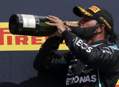 Lewis Hamilton celebrates his victory.