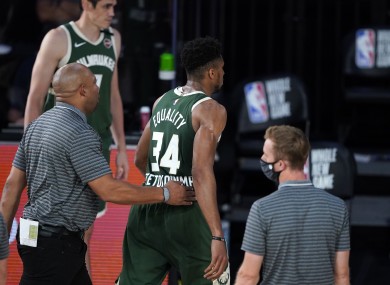 Giannis Antetokounmpo heads to the locker room after being ejected from the game.