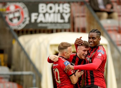 Bohemians’ Danny Grant celebrates scoring a goal with Keith Ward and Andre Wright.