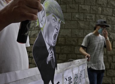 Pro-China supporters outside the US Consulate in Hong Kong today.